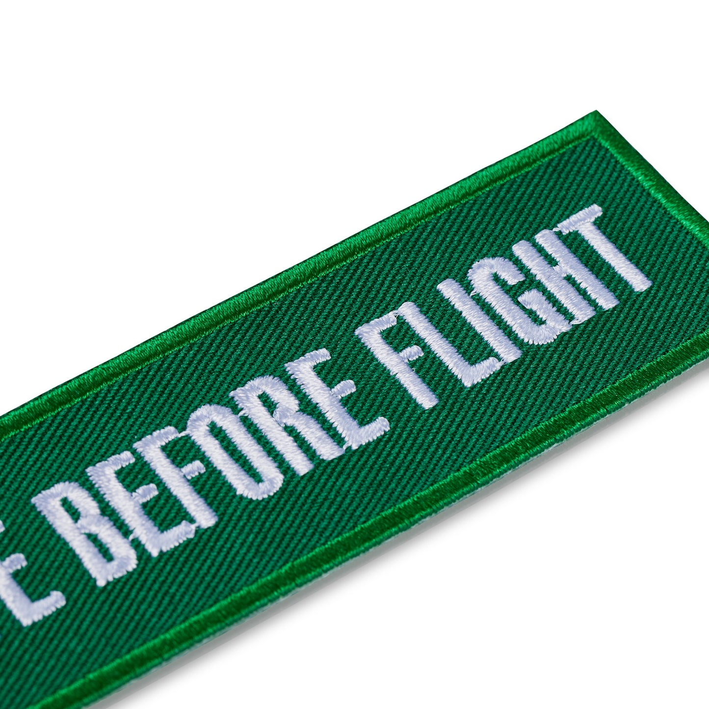 Schluesselanhaenger REMOVE BEFORE FLIGHT Island detail