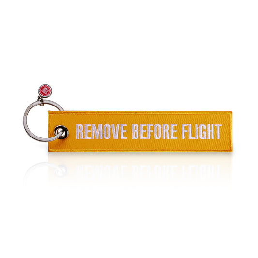 Schluesselanhaenger REMOVE BEFORE FLIGHT Sunshine